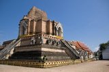 Wat Chedi Luang translates literally from the Thai as ‘Monastery of the Great Stupa’. Construction of the temple began at the end of the 14th century when the Lan Na Kingdom was in its prime. King Saen Muang Ma (1385-1401) intended it as the site of a great reliquary to enshrine the ashes of his father, King Ku Na (1355-85). Today it is the the site of the Lak Muang or City Pillar. The annual Inthakin ceremony occurs within the confines of the temple.<br/><br/>

Chiang Mai (meaning "new city"), sometimes written as "Chiengmai" or "Chiangmai", is the largest and most culturally significant city in northern Thailand. King Mengrai founded the city of Chiang Mai in 1296, and it succeeded Chiang Rai as capital of the Lanna kingdom. 